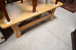 A modern lightwood coffee table , possibly Ercol, approx. 125 x 65cm