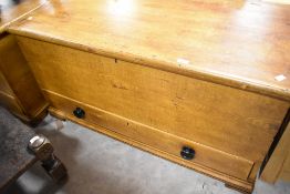 A 19th Century scumbled pine bedding chest having drawer to base with ebonised handles, dimensions