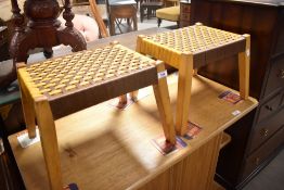 A pair of vintage strung foot stools