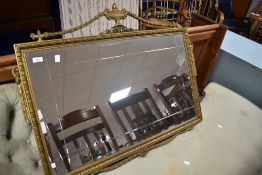 A vintage gilt framed wall mirror having urn and swag decoration, labelled Mirror-Belle, width