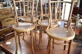 Four traditional bentwood dining/bistro chairs