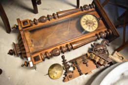 A 19th Century mahogany Vienna style wall clock, with Roman numeral dial and typical red fleur de