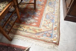 A traditional Turkmen style wool rug, approx. 170 x 118cm