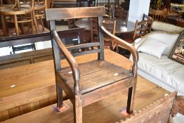 A 19th Century oak childs carver chair, seat height approx. 28cm, width 40cm