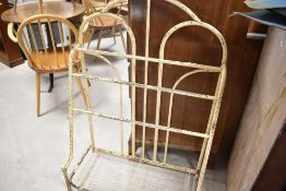 A vintage metal luggage/towel rack, width approx. 71cm