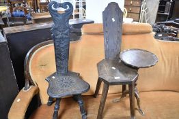 Two traditional spinning chairs and a reproduction wine table