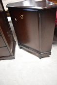 A vintage mahogany corner cabinet , by Stag, height approx. 82cm