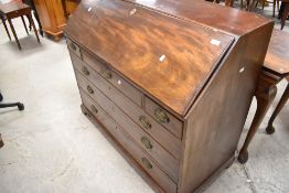 A 19th Century mahogany bureau having fitted interior including later green felt , drawers fitted