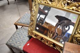 A giltwood rococo style wall mirror, approx. 66 x 57cm