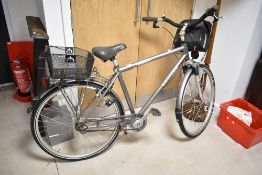 A Kettler Alu-Rad City Tour 17 inch fixed frame bike, including handlebar bag, rear basket and