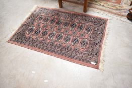 A small fireside or prayer rug in the Bokhara style, approx. 96 x 66cm
