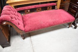 A Victorian stained frame chaise longue in burgundy upholstery