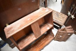An Indian style carved small stool, width approx. 35cm, and a small stained pine wall shelf etc