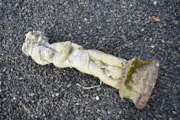 A concrete garden ornament modelled as a cherub with fish, height approx 84cm