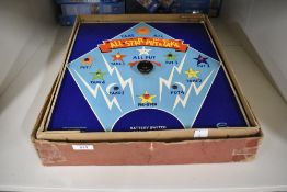 A mid-century battery-operated tabletop game titled All-Star Electric Put and Take. The game board