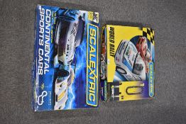 A pair of boxed electric slot car racing sets manufactured by Scalextric (Hornby Hobbies) in 1:32