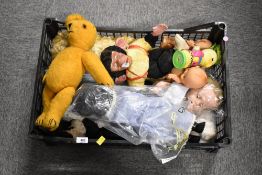 This collection features a variety of vintage soft toys and dolls. The group includes a beige