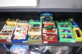 A collection of vintage-style die-cast model vehicles, primarily manufactured by Lledo for their