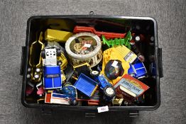 A large assortment of toy vehicles and novelties. The collection includes several die-cast Tonka