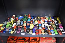 A substantial group of toy vehicles of various scales and types, constructed from a mixture of die-
