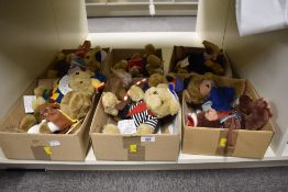 A collection of dressed plush teddy bears, featuring a variety of themed outfits and accessories.