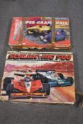 A lot comprising two vintage electric slot car racing sets by Scalextric. The first set is a