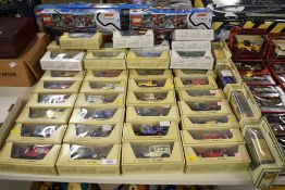 This collection comprises an assortment of die-cast metal toy vehicles and plastic construction