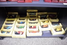 A collection of twenty-one Matchbox Models of Yesteryear die-cast model vehicles. Each vehicle is