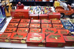 A substantial lot comprising a collection of die-cast and pressed steel toy vehicles. The primary