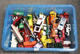 A substantial collection of vintage toy vehicles, primarily constructed from die-cast metal with