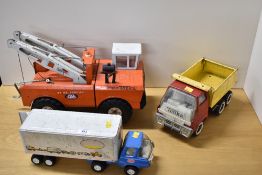 This lot comprises three vintage vehicles manufactured by Tonka. The first is a Mighty Tonka CAA