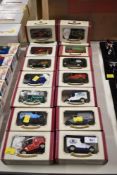 A collection of 14 vintage-style model delivery vehicles manufactured by Oxford Die-Cast. Each model