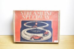 A vintage Louis Marx and Co Ltd Streamline Speedway toy racing set manufactured in Dudley,