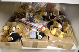 This lot comprises a collection of approximately 12-15 dressed miniature plush teddy bears from