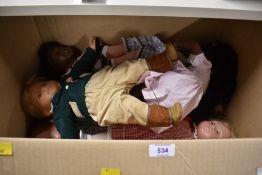 A collection of modern dolls, including two examples by the French manufacturer Corolle. One doll