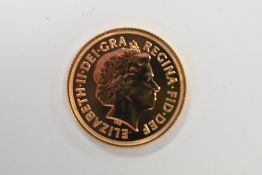 An Elizabeth II 2014 Gold Sovereign, Royal Mint, Rev George And Dragon, 8.00 Grams.