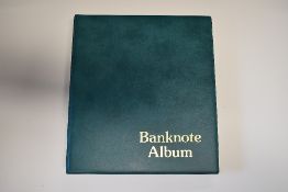 An Album Of World Bank Notes, Comprising, Barbados 2 Dollars, Bermuda 2 dollars, Bhutan 1, 2, 5,