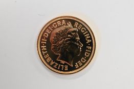 An Elizabeth II 2014 Gold Sovereign, Royal Mint, Rev George And Dragon, 8.00 Grams.