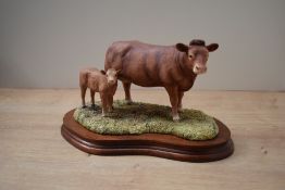 A limited edition Border Fine Arts animal group 'Limousin Cow & Calf' model number L157, designed by