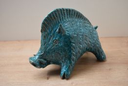 A 20th century dark blue-green glazed ceramic boar study, similar to Italian mid-century designs,