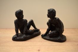 After Karin Jonzen (British 1914-1998) two Heredities style bronze resin figures 'Boy Athlete'