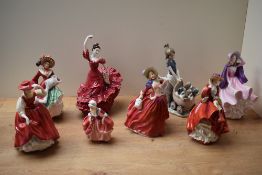 A group of five Royal Doulton figurines comprising 'Top O The Hill' HN 1834, 'Buttercup' HN 2399, '