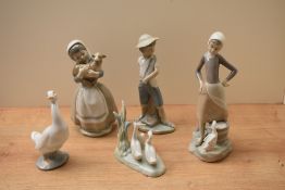 A group of six Lladro and Nao by Lladro porcelain studies to include 'Girl with milk pail and goose'