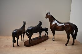 A group of three Beswick Pottery horse studies comprising 'Large Racehorse' model number 1564