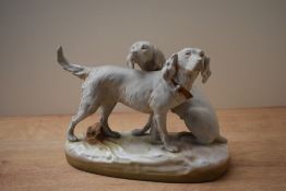 Kunst porcelain, In the manner of Royal Dux, depicting a pair of setters, one seated, the other