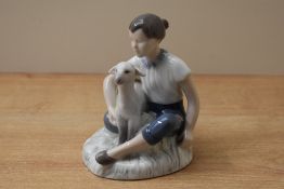 A Royal Copenhagen porcelain figurine 'Girl with Happy Lamb' model number 2336 measures 13.5cm