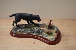 A Border Fine Arts animal group 'Black Labrador & Pheasants' model number A1671 designed by Margaret