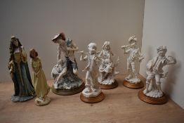A group of seven resin figures and figurines to include Regals Fine Arts 'Celtic Princess' and