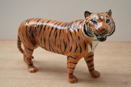 A Beswick pottery Tiger study, model number 2096 designed by Graham Tongue in tan with black stripes