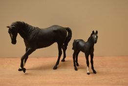 Two Beswick Pottery horse studies 'Black Beauty' model number 2466 designed by Graham Tongue and '